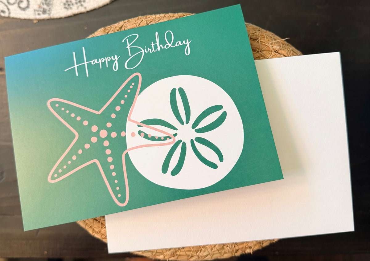 Happy Birthday folded greeting card with starfish and sand dollar design