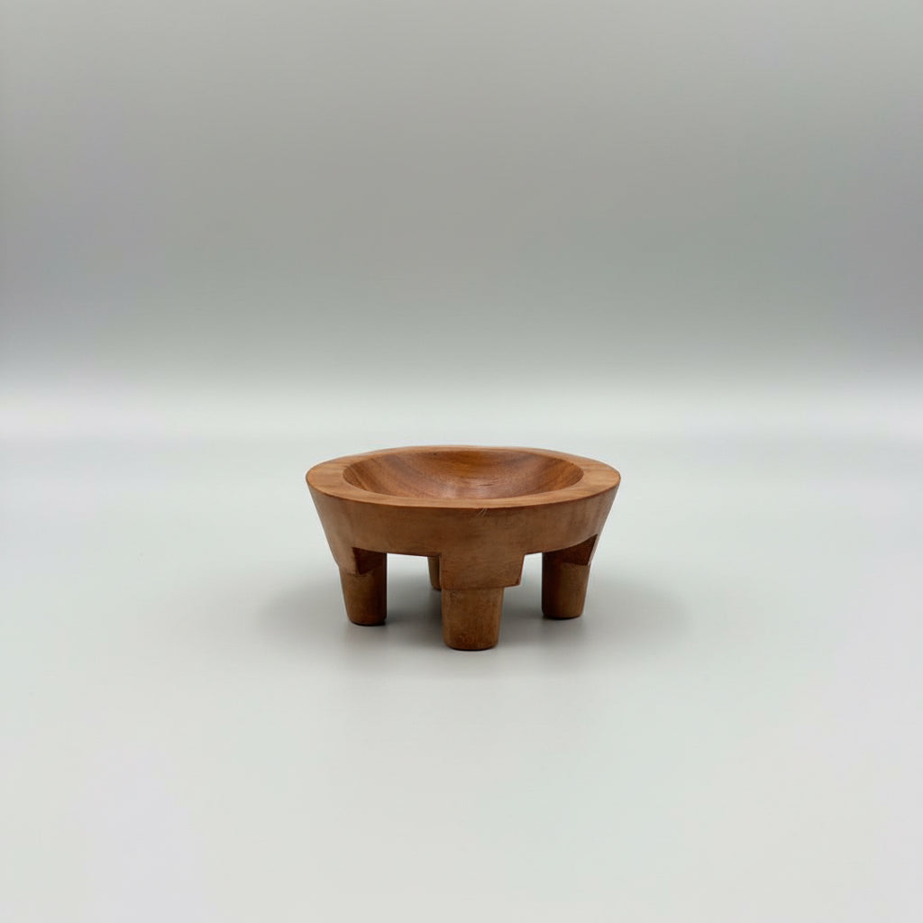 Three miniature Samoan tanoa showing natural variations in ifilele wood