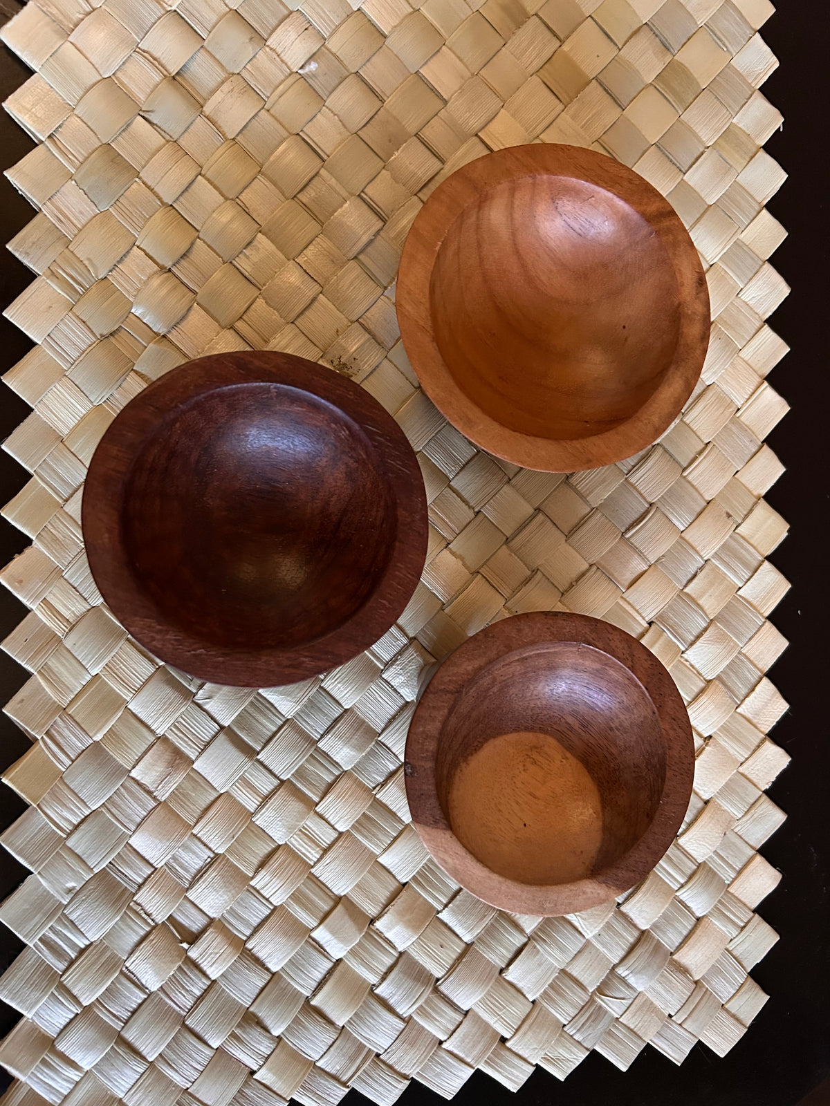 Interior detail showing the natural grain and coloring of ifilele wood