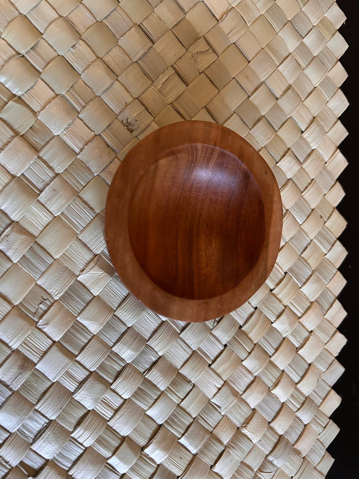 Miniature Samoan tanoa handcrafted from ifilele wood, shown from above